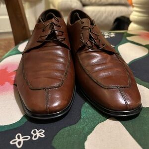Salvatore Ferragamo brown leather dress shoes. Rubber sole